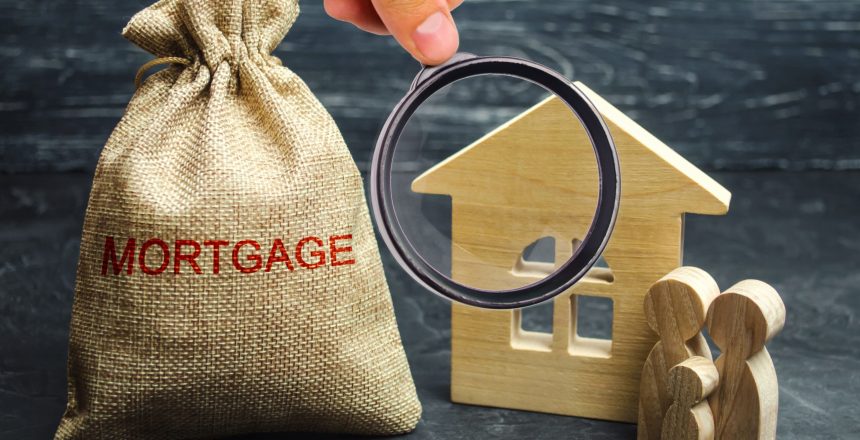 A bag with money and the word Mortgage and a wooden house. The accumulation of money to pay interest rates on mortgages. Buying a property in debt. Take credit for housing. Loan for housing. Find High-Quality Vintage Mortgages Leads Sourcing for Success Harder | Mortgage Lead